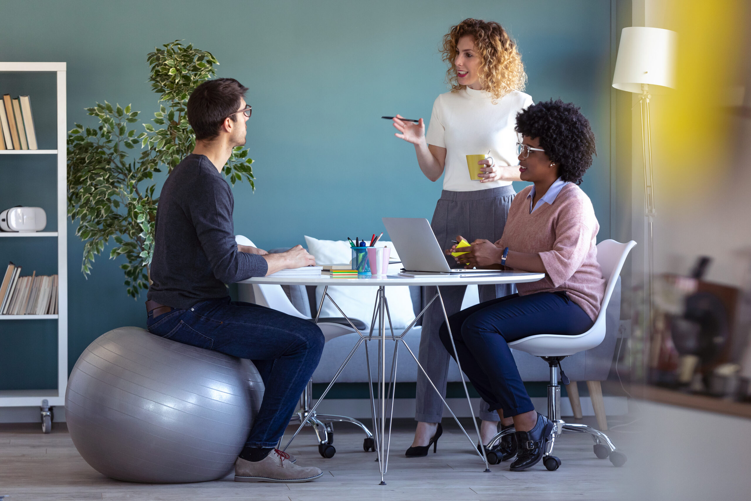 A sales lead helping her underperforming team members