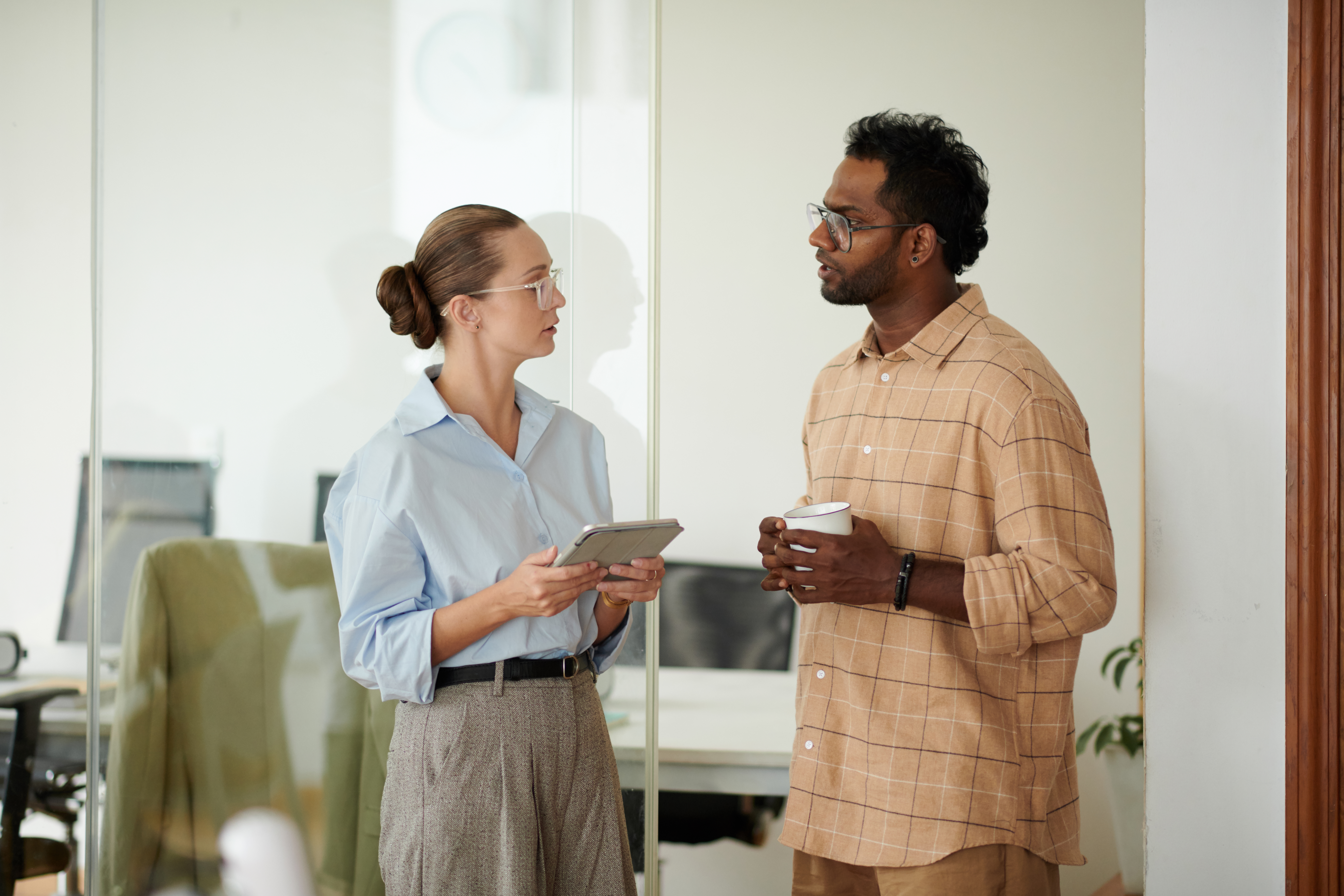 Professional colleagues talking about job referrals